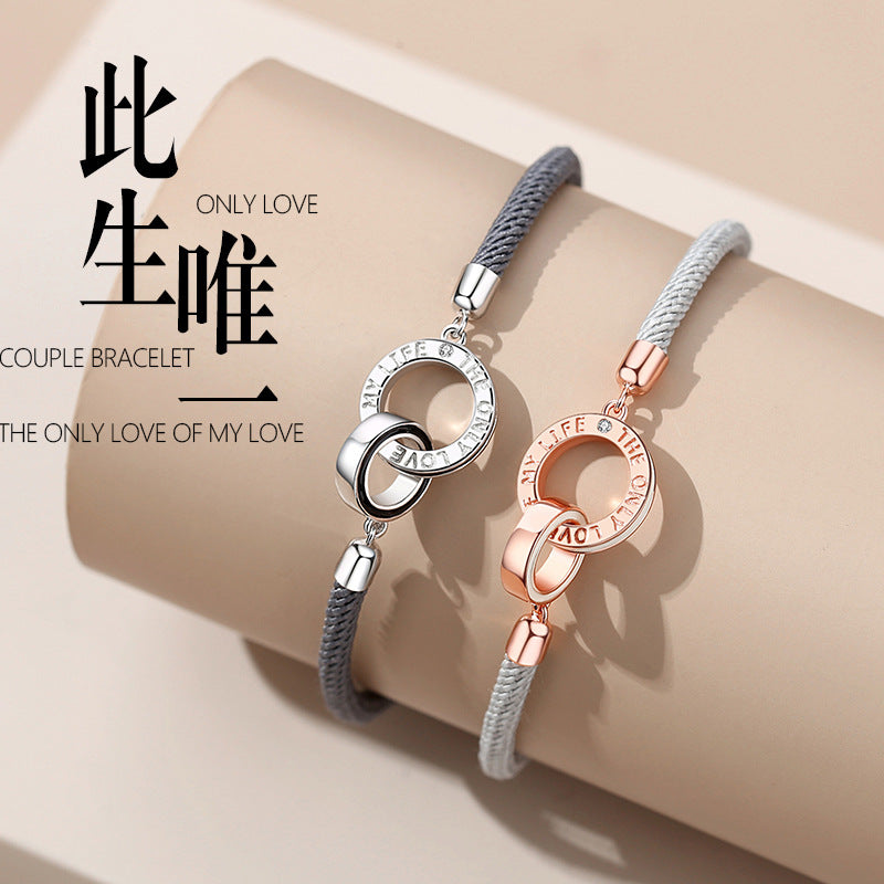 Two couple bracelets with silver and rose gold designs on a beige background.