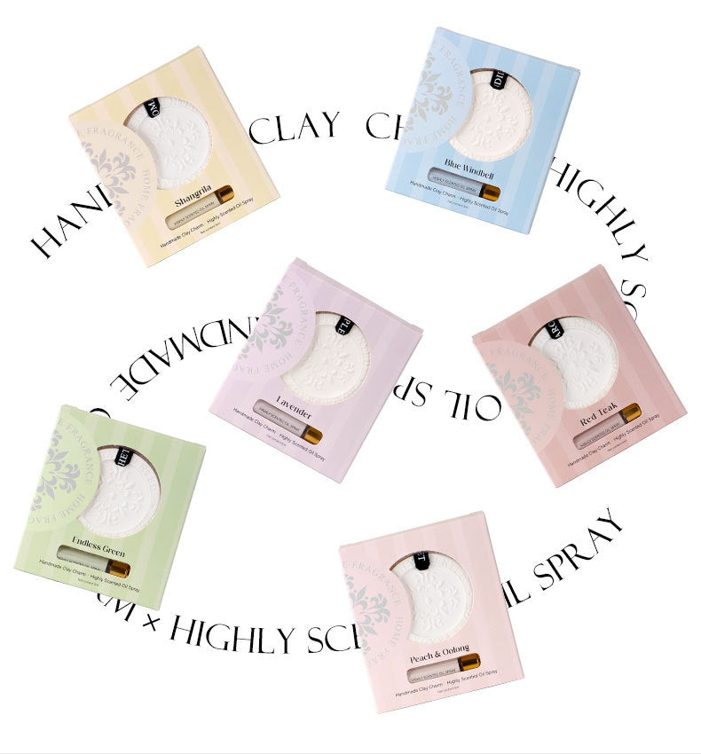 Set of six small bottles with different colored packaging on a white background