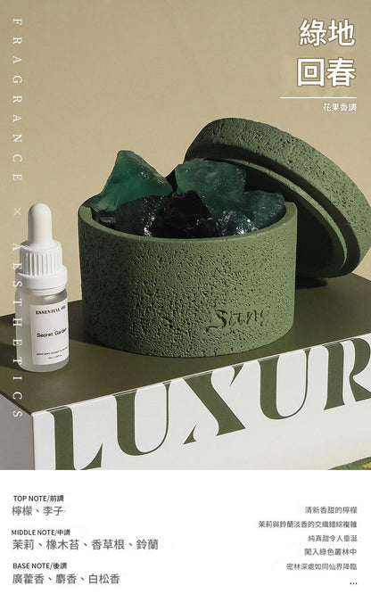 Green textured container with a dropper bottle on a beige background