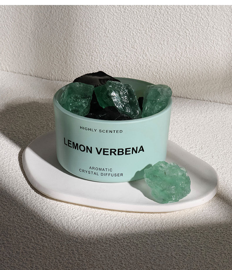 Lemon Verbena crystal diffuser with green crystals on a white surface