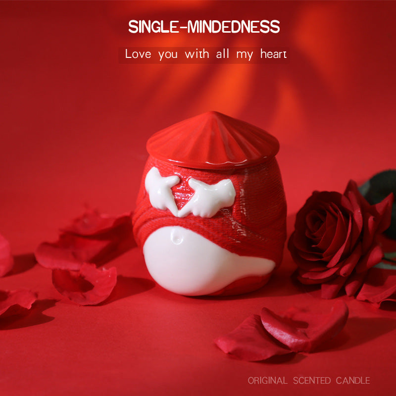 Red and white scented candle with roses on a red background, featuring the text 'Single-Mindedness: Love you with all my heart'.