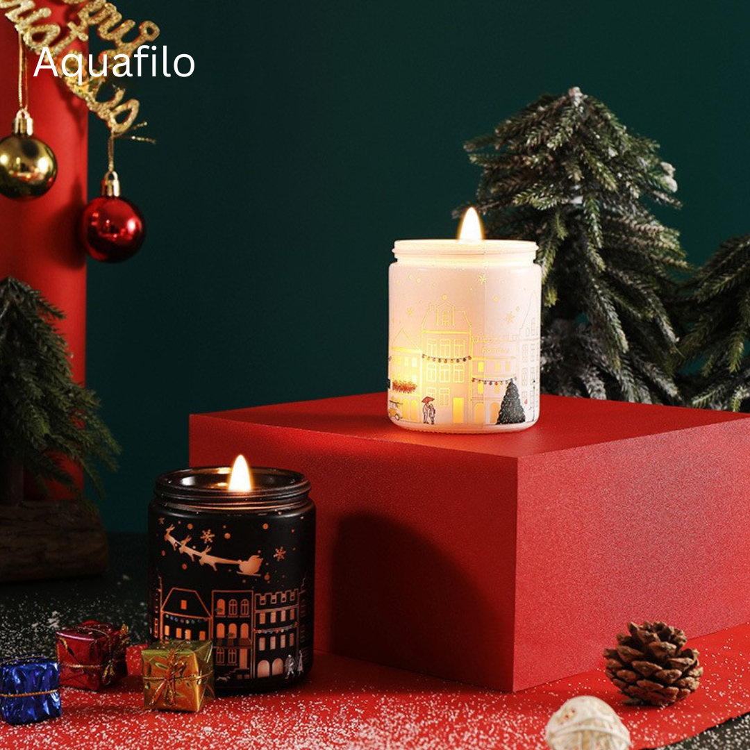 Decorative candles on a red platform with Christmas decorations and 'Aquafilo' branding.