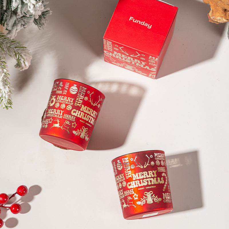 Red 'Merry Christmas' cups with a 'Funday' box on a light background