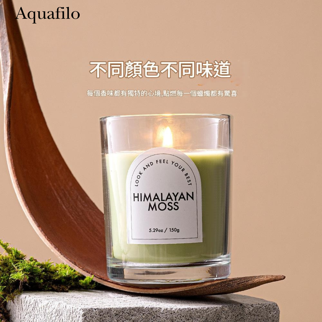 Himalayan Moss candle with a label on a beige background, featuring the brand 'Aquafilo'.