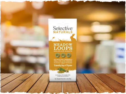 Selective Naturals Meadow Loops package on a wooden surface with a blurred background