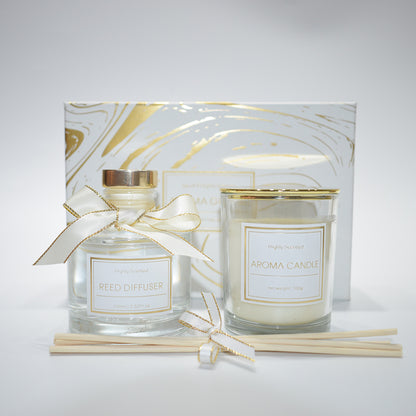 Aroma candle set with reed diffuser and packaging on a white background