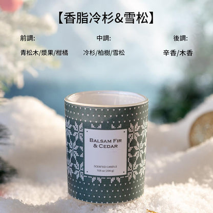 Scented candle with 'Balsam Fir & Cedar' label on a snowy background