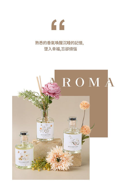 Aromatherapy products with flowers on a neutral background, featuring the brand 'AROMA'.