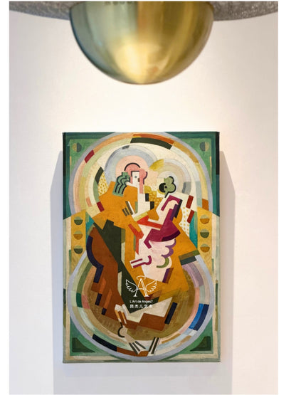 Colorful abstract painting on a white wall with a gold light fixture above.