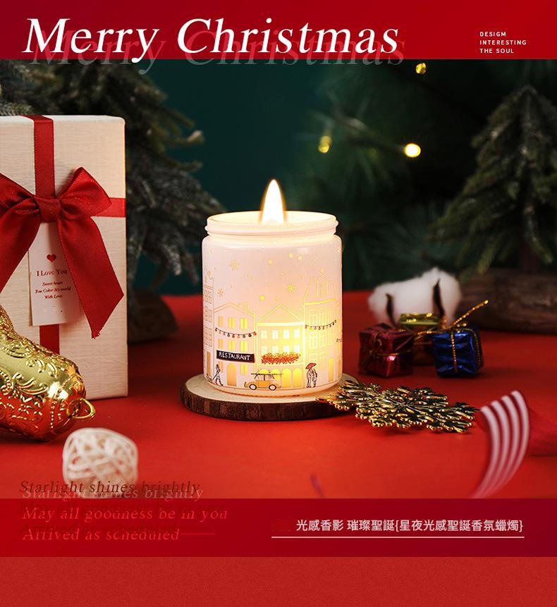 Decorative candle with Christmas-themed packaging and text on a red background
