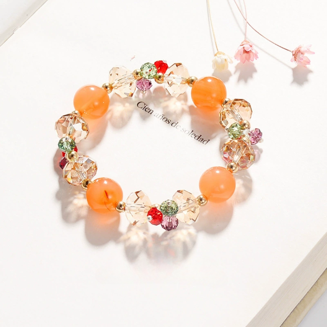 Necklace with colorful beads on a white background